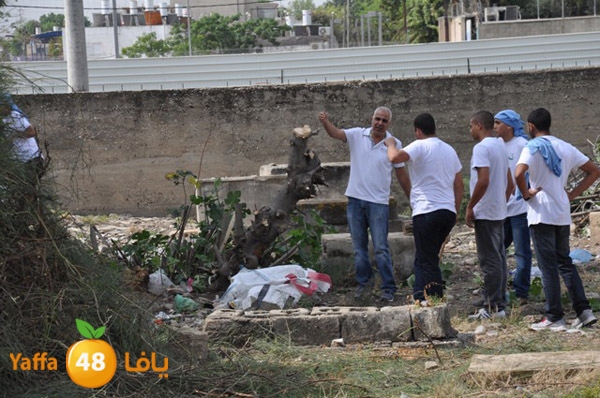 من أرشيف يافا 48 - مشاركة طلاب يافا في مشروع تنظيف مقبرة الشيخ مراد عام 2013