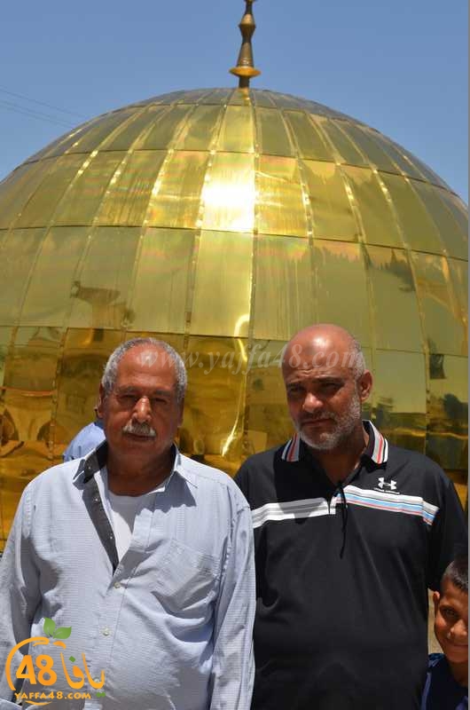 بالصور: رفع القبة الذهبية لمسجد النور في مدينة اللد 