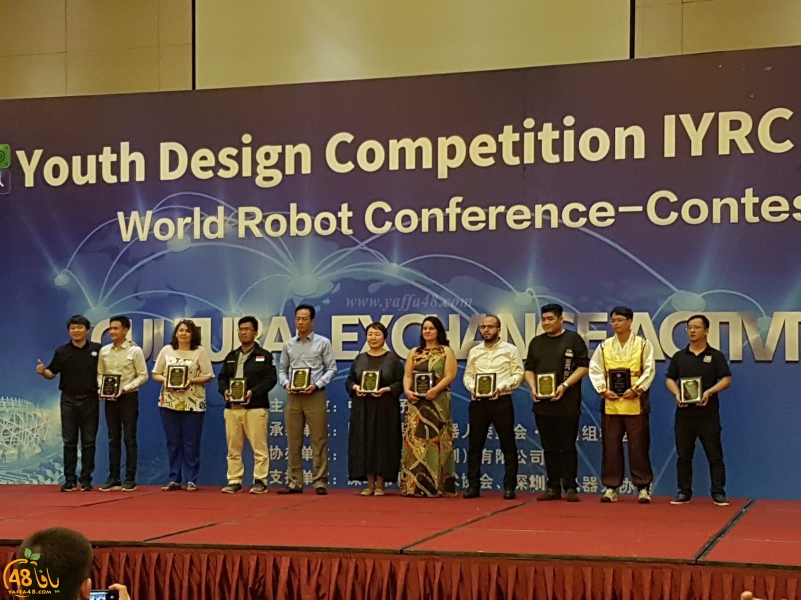 صور: طلاب من اللد والرملة يشاركون في مسابقة الروبوتات العالمية بالصين