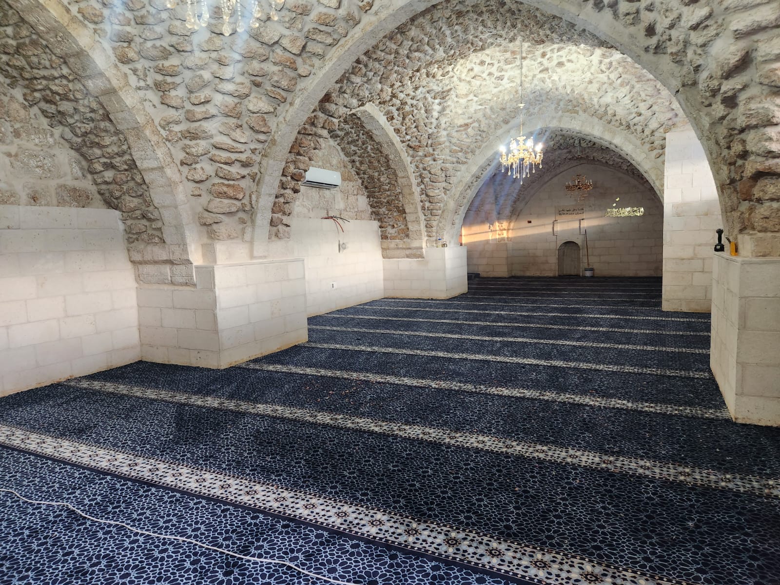 مسجد يرسّخ رسالةً تقرير حول ترميم مسجد العمري في مدينة اللد