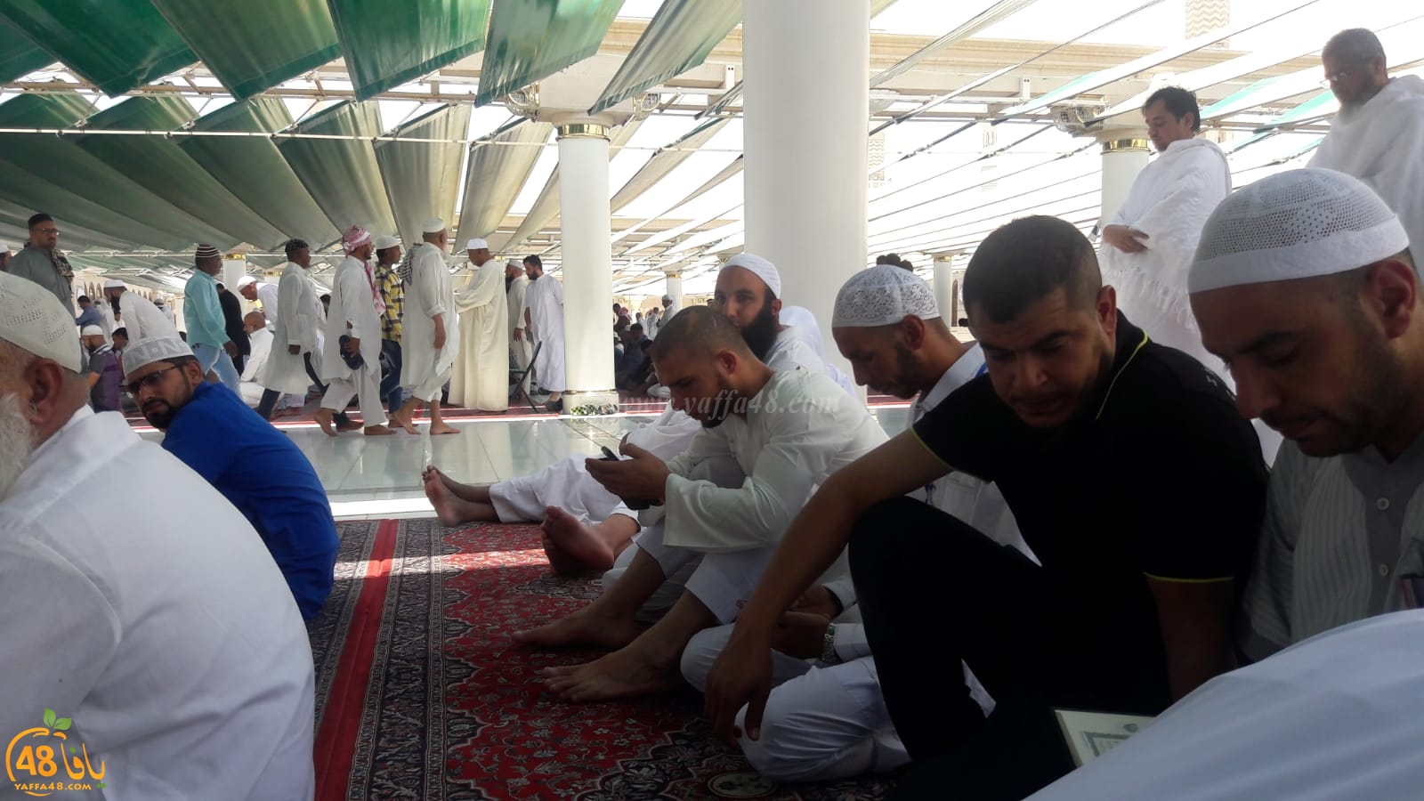 صور: معتمرو اللد يغادرون المدينة المنورة إلى مكة المكرمة لأداء عمرة رمضان