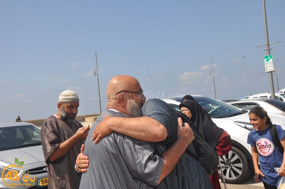  بالصور: عودة الفوج الرابع من معتمري مدينة يافا إلى ديارهم سالمين