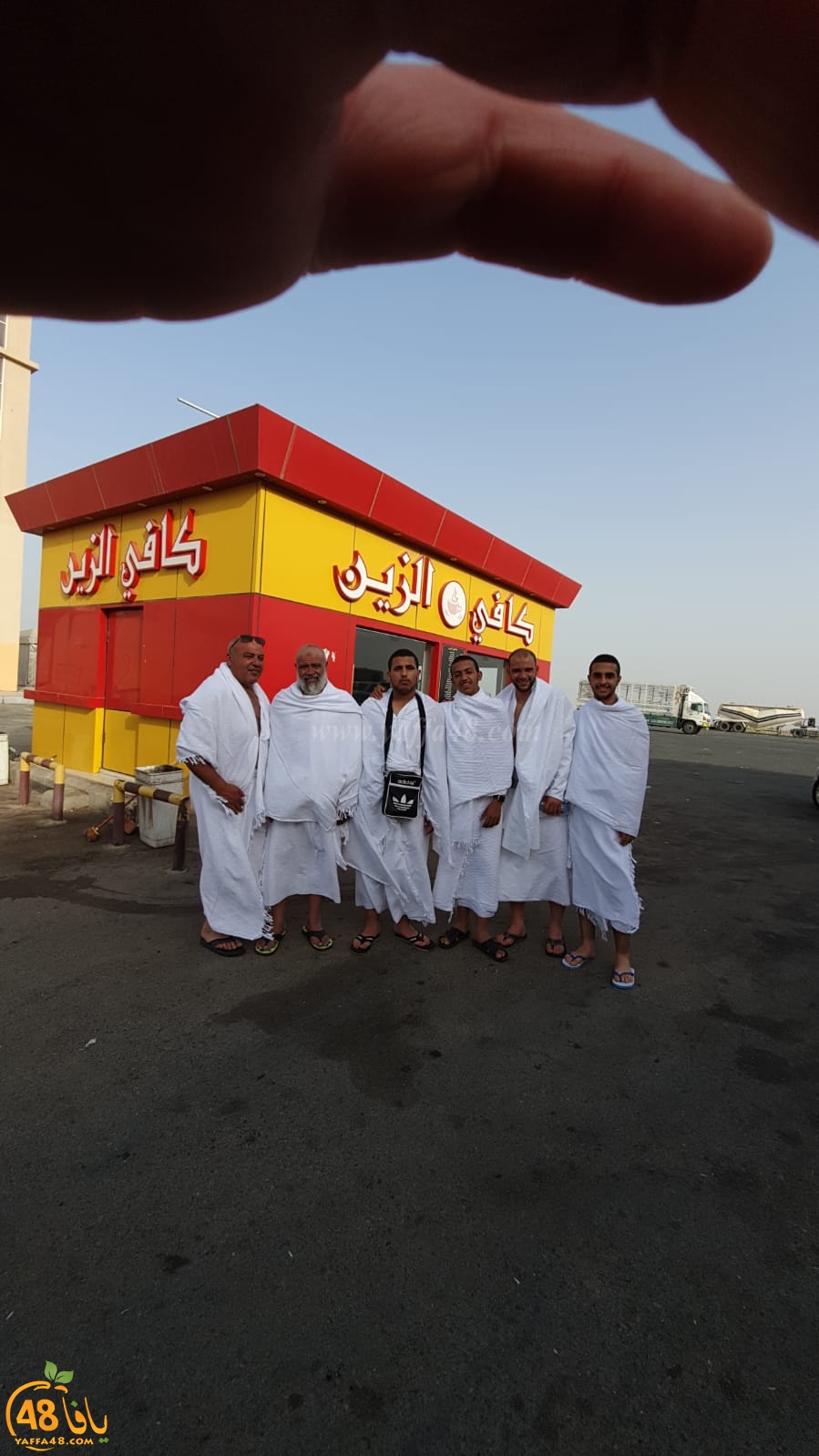    بالصور: معتمرو اللد والرملة الفوج الثاني يصلون إلى مكة المكرّمة 