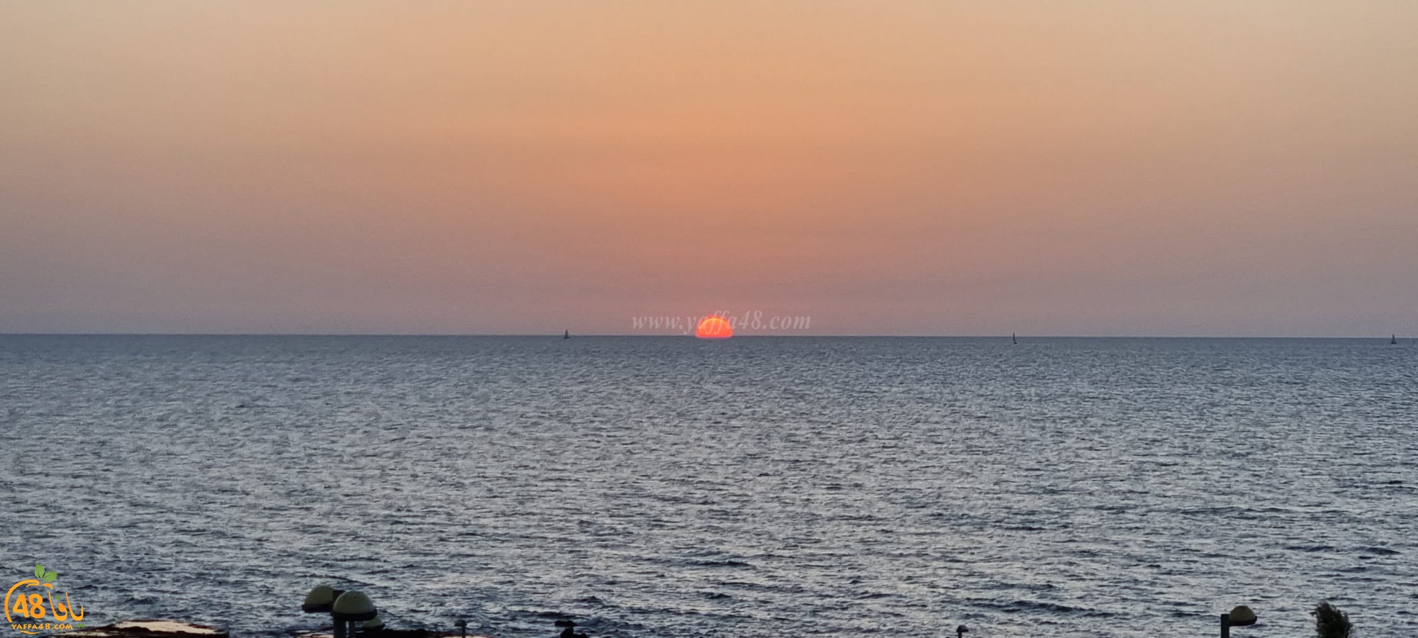 مشاهد ساحرة لغروب الشمس من أمام شاطئ يافا 