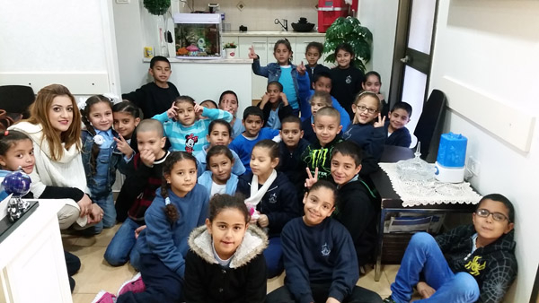 طلاب صفوف الثواني من مدرسة حسن عرفة في عيادة طبيب الاسنان