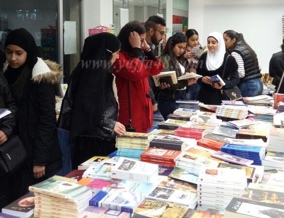 طلاب مشروع "التميّز بلغتنا" يزورون معرض الكتاب العربي في جامعة تل ابيب