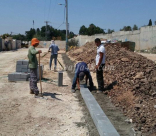  بالصور: العمل مستمر في تعبيد شارع شنير في مدينة اللد 