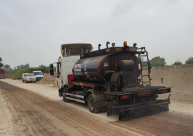  تعبيد الشارع الواصل بين حي شنير باللد وقرية دهمش 