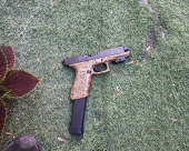  اللد: اعتقال مشتبه بحيازة مسدس وذخيرة