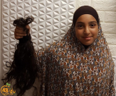  الطفلة "روضة موسى اليتيم" تتبرع بشعرها للأطفال المرضى بالسرطان 