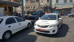  بالصور: شرطي يلاحق أصحاب المحلات التجارية في ارزاقهم بتحرير مخالفات سير لزبائنهم