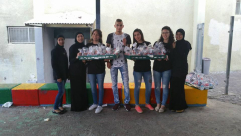 اللد: متطوّعي مجموعات جذور يوزعون الحلوى بمناسبة ذكرى الاسراء والمعراج