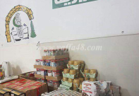  بالصور: مركز الهدى للاعمال الخيرية في الرملة يوزّع عشرات الطرود الغذائية على العائلات المستورة