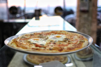 يوم البيتزا العالمي - تناولوا أشهى أنواع البيتزا فقط لدى "بيتزا كالميرو"