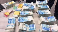 الشرطة: ضبط أكثر من مليون شيكل خلال مداهمة لمجمعات سكنية في اللد